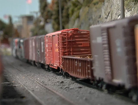Classification yard with freight cars waiting to be sorted and depart for new destination
