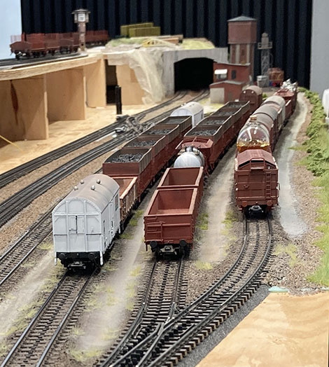 Classification yard with freight cars waiting to be sorted and depart for new destination